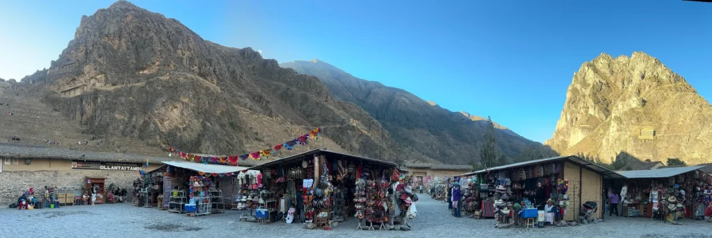 Local market at Ollantaytambo with the Inca fortress in the background