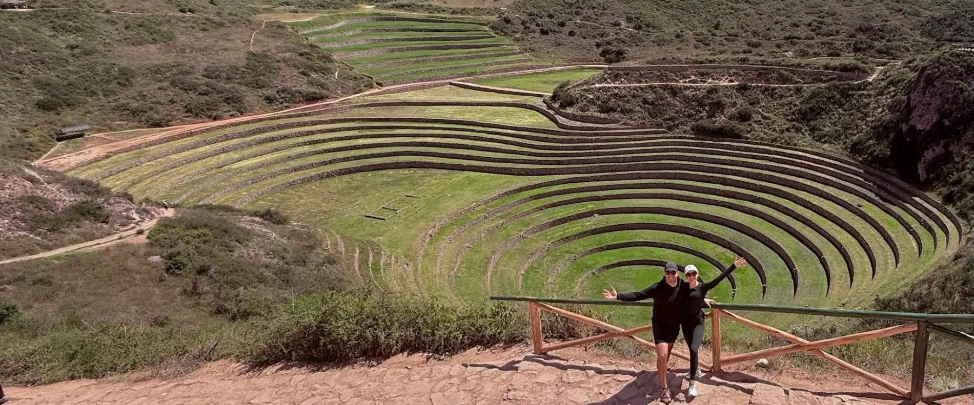 Couple at the Inca terraces of Moray during the Maras Moray Tour in Peru’s Sacred Valley